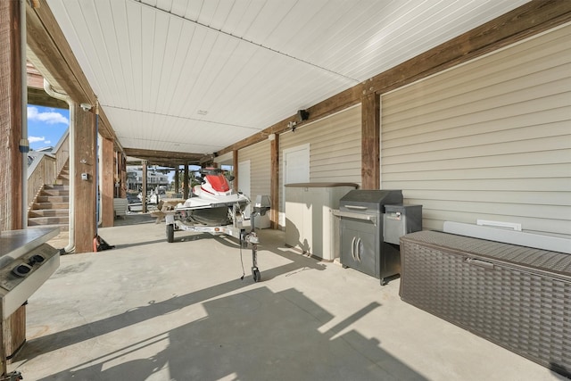 22102 Pecos Dr, Galveston, TX 77554 - view of patio featuring stairway