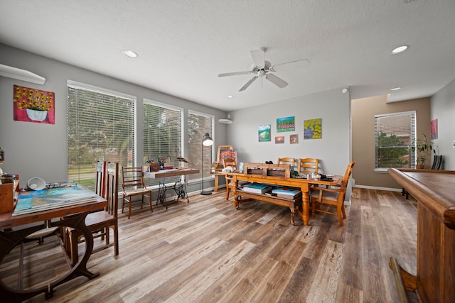 12604 Pegasus Dr, Willis, TX 77318 - dining room with baseboards, recessed lighting, ceiling fan, a textured ceiling, and light wood-type flooring