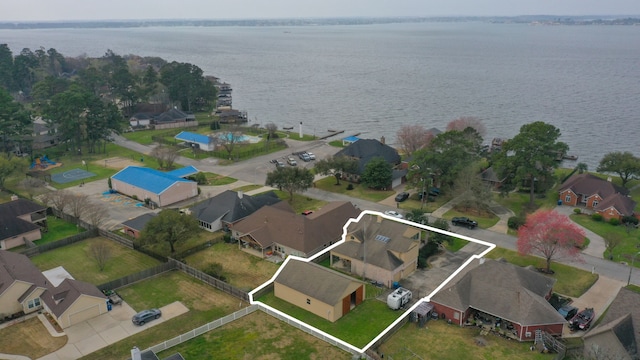 12604 Pegasus Dr, Willis, TX 77318 - aerial view featuring a residential view and a water view