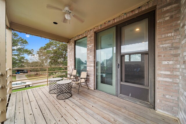 12604 Pegasus Dr, Willis, TX 77318 - deck with a ceiling fan