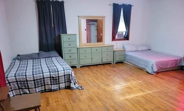 bedroom with light wood-style flooring