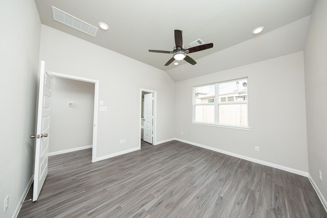 3626 Spy Glass Hill Dr, Montgomery, TX 77356 - unfurnished bedroom with vaulted ceiling, visible vents, wood finished floors, and baseboards
