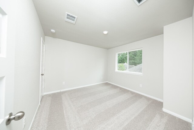 3626 Spy Glass Hill Dr, Montgomery, TX 77356 - empty room featuring carpet, visible vents, and baseboards