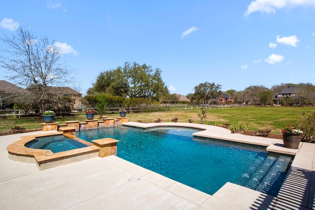 view of pool with a patio area and a pool with connected hot tub