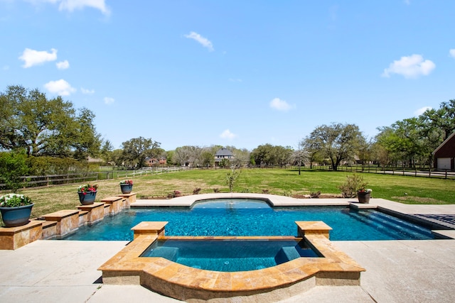 swimming pool featuring an in-ground hot tub