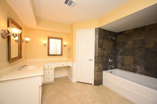 bathroom with vanity, visible vents, and bathtub / shower combination