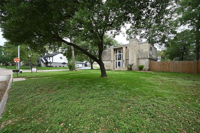 view of yard with fence