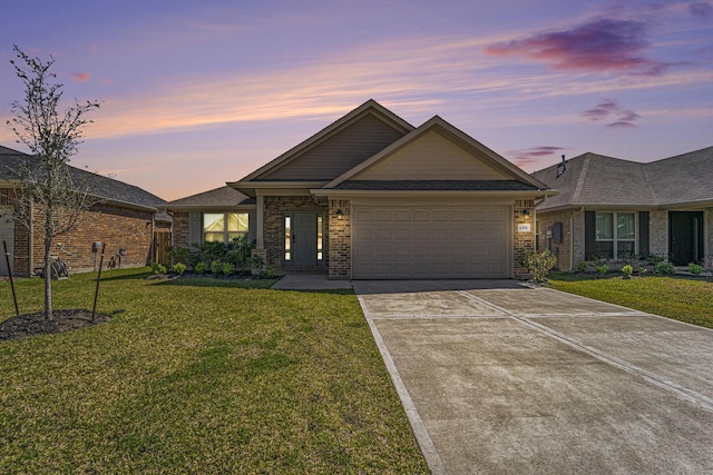 4306 Chadwick Rd, Texas City, TX 77591 - view of front facade featuring brick siding, a front lawn, concrete driveway, and an attached garage