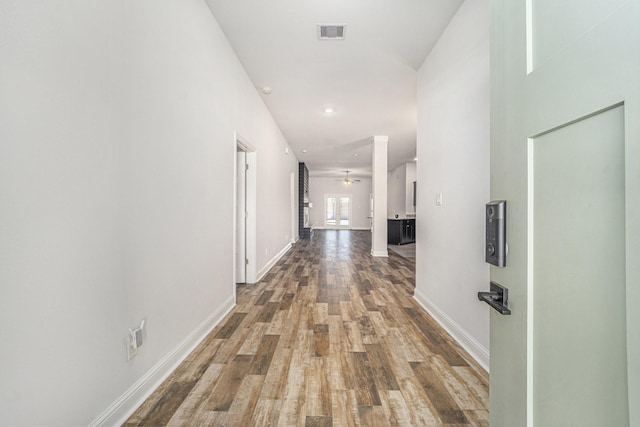 4306 Chadwick Rd, Texas City, TX 77591 - hall with recessed lighting, visible vents, baseboards, and wood finished floors