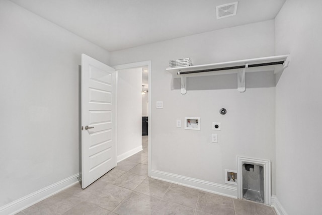 4306 Chadwick Rd, Texas City, TX 77591 - laundry area with electric dryer hookup, visible vents, washer hookup, baseboards, and laundry area