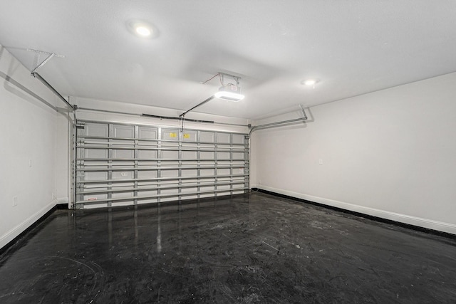 4306 Chadwick Rd, Texas City, TX 77591 - garage featuring baseboards and a garage door opener