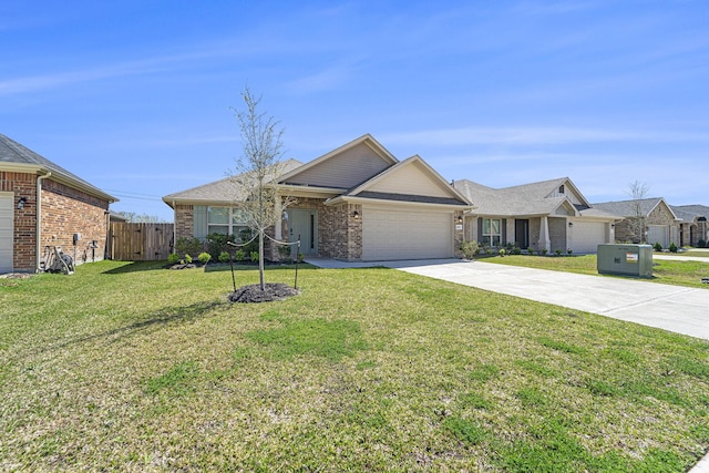 4306 Chadwick Rd, Texas City, TX 77591 - single story home with brick siding, fence, concrete driveway, a front yard, and a garage