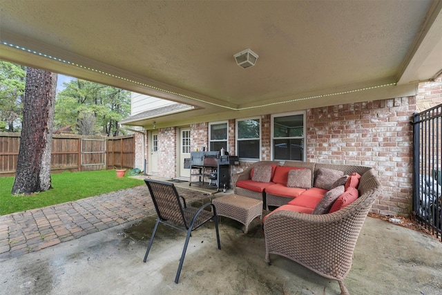12635 Ivyforest Dr, Cypress, TX 77429 - view of patio featuring an outdoor living space, fence, and area for grilling
