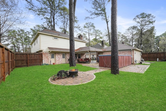 12635 Ivyforest Dr, Cypress, TX 77429 - view of yard with a fire pit, a patio area, a hot tub, and a fenced backyard