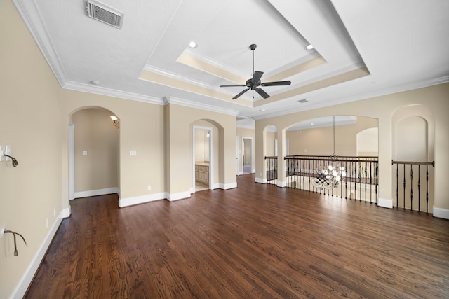 4628 Beech St, Bellaire, TX 77401 - unfurnished living room with ceiling fan, a tray ceiling, ornamental molding, dark wood-style floors, and a chandelier
