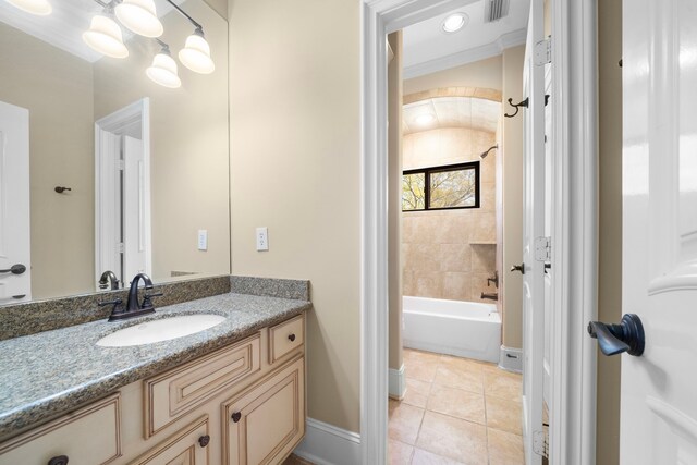 4628 Beech St, Bellaire, TX 77401 - full bath with vanity, tile patterned floors, tub / shower combination, and baseboards