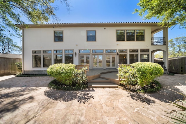 4628 Beech St, Bellaire, TX 77401 - back of house with french doors and a patio area