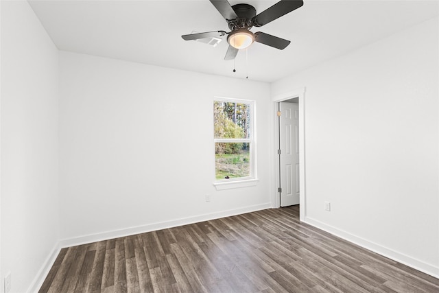 301 Pineland Dr, Trinity, TX 75862 - spare room with baseboards, wood finished floors, and a ceiling fan