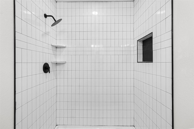 301 Pineland Dr, Trinity, TX 75862 - bathroom featuring a tile shower