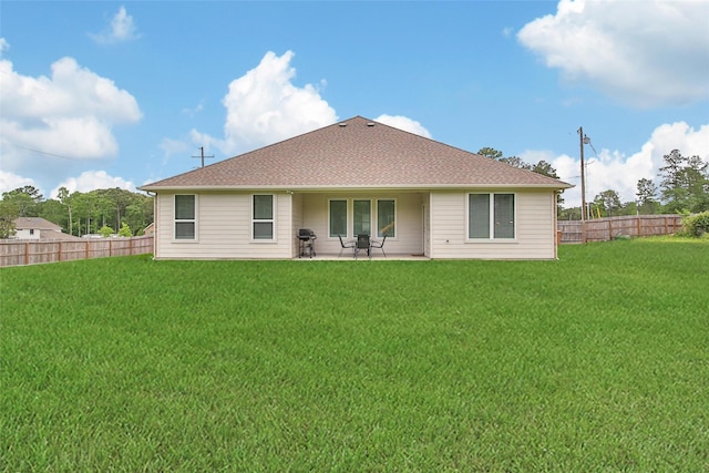 139 Jim Hall Ln, New Waverly, TX 77358 - back of property featuring a patio area and roof with shingles