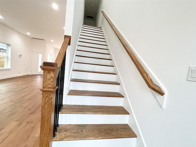 3038 Webster St, Houston, TX 77004 - stairway with recessed lighting, baseboards, and wood finished floors