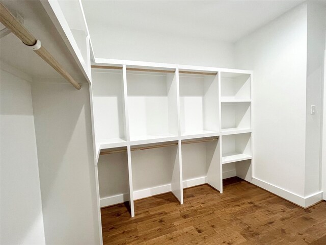3038 Webster St, Houston, TX 77004 - walk in closet featuring wood finished floors