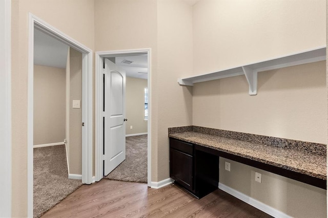 14356 N Summerchase Cir, Willis, TX 77318 - interior space featuring baseboards, visible vents, and light wood finished floors