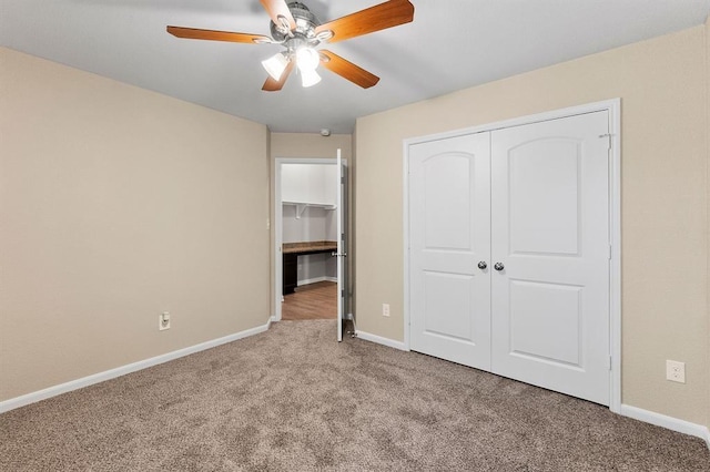 14356 N Summerchase Cir, Willis, TX 77318 - unfurnished bedroom featuring a closet, baseboards, and carpet flooring