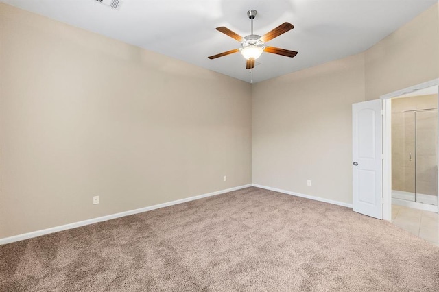 14356 N Summerchase Cir, Willis, TX 77318 - spare room featuring baseboards, a ceiling fan, and light colored carpet