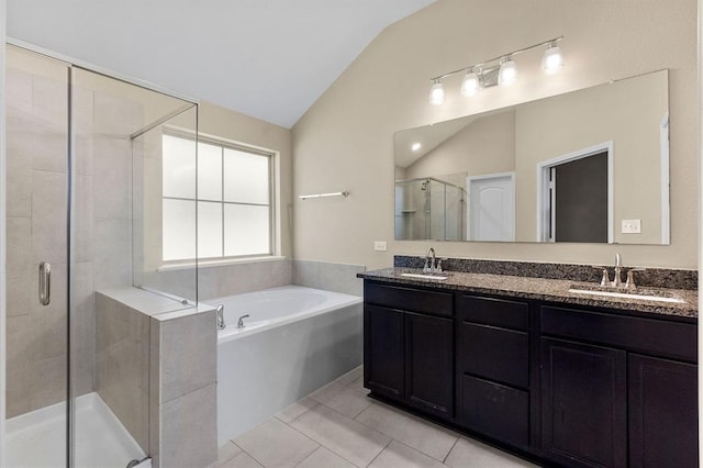 14356 N Summerchase Cir, Willis, TX 77318 - bathroom with a garden tub, a sink, lofted ceiling, and a shower stall
