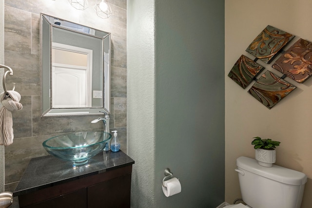 19542 Juniper Breeze Ln, Spring, TX 77379 - half bathroom featuring vanity and toilet