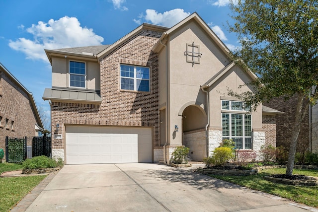 19542 Juniper Breeze Ln, Spring, TX 77379 - traditional-style house with stone siding, a garage, stucco siding, fence, and concrete driveway
