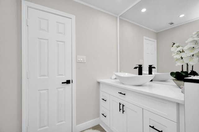 5510 Braesvalley, Houston, TX 77096 - bathroom with vanity, crown molding, recessed lighting, and baseboards