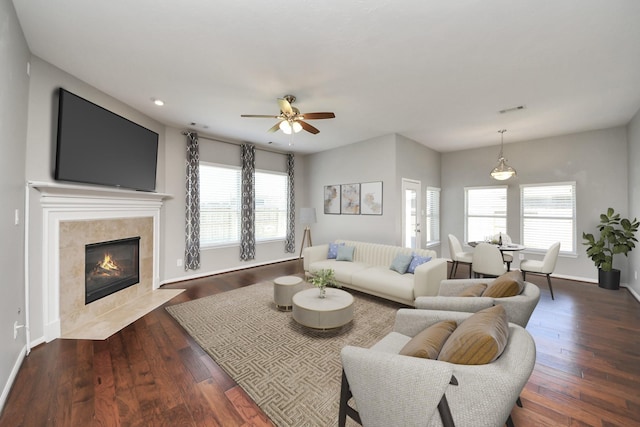 12427 Point Arbor Ct, Tomball, TX 77377 - living area featuring ceiling fan, dark wood-style flooring, a tile fireplace, recessed lighting, and baseboards