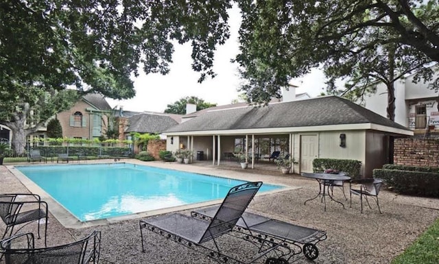 2323 Augusta Dr Unit 36, Houston, TX 77057 - community pool featuring a patio and fence