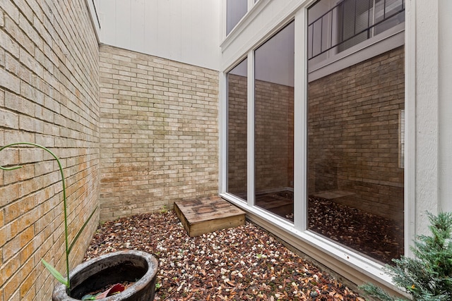 2323 Augusta Dr Unit 36, Houston, TX 77057 - bathroom featuring brick wall