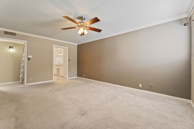 2323 Augusta Dr Unit 36, Houston, TX 77057 - unfurnished bedroom featuring ornamental molding, carpet floors, baseboards, ensuite bath, and ceiling fan