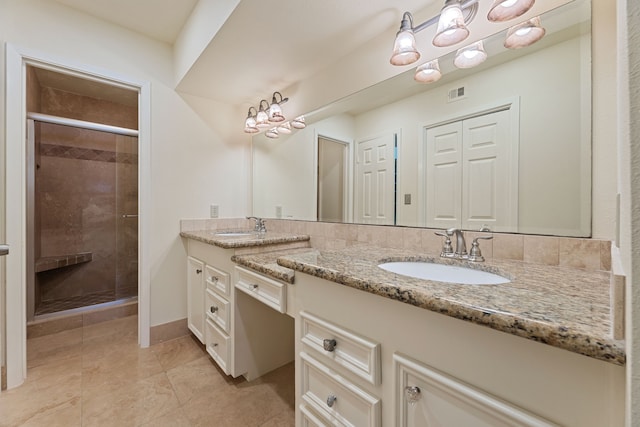 2323 Augusta Dr Unit 36, Houston, TX 77057 - bathroom featuring double vanity, a stall shower, and tile patterned flooring