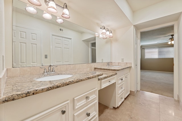 2323 Augusta Dr Unit 36, Houston, TX 77057 - full bath with double vanity, ceiling fan, baseboards, and tile patterned floors