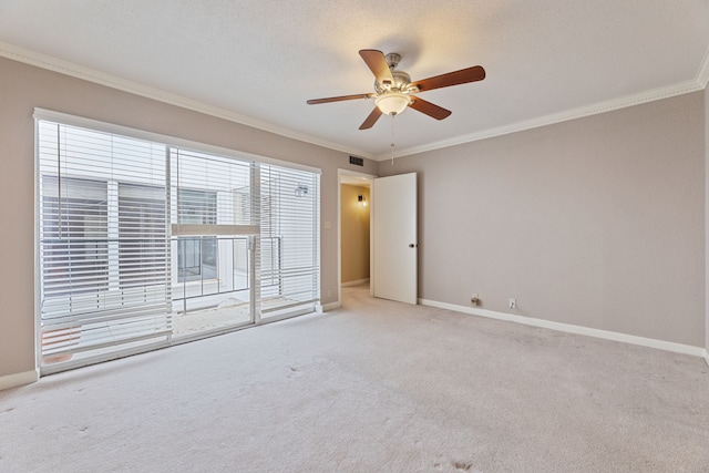 2323 Augusta Dr Unit 36, Houston, TX 77057 - spare room featuring crown molding, carpet, ceiling fan, and baseboards