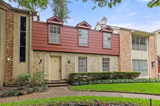 2323 Augusta Dr Unit 36, Houston, TX 77057 - view of property featuring brick siding