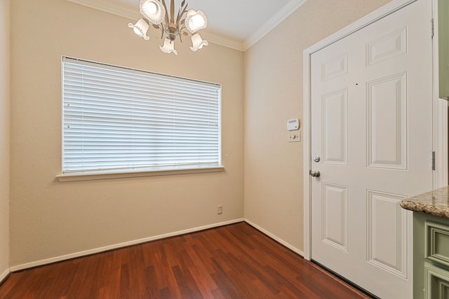 2323 Augusta Dr Unit 36, Houston, TX 77057 - foyer entrance featuring crown molding, a chandelier, dark wood-type flooring, and baseboards