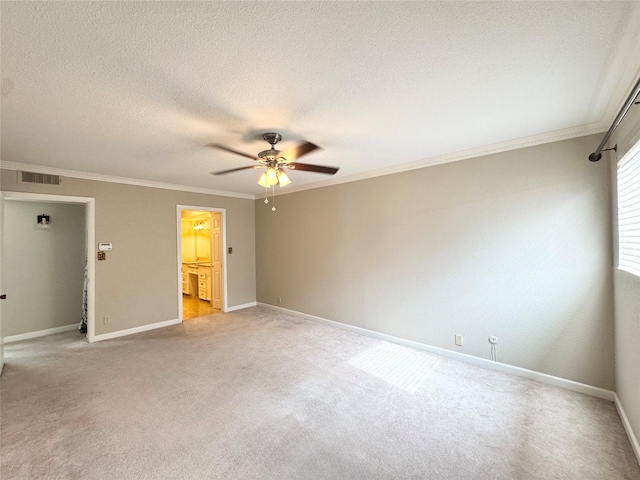 2323 Augusta Dr Unit 36, Houston, TX 77057 - unfurnished room featuring a ceiling fan, crown molding, light colored carpet, and a textured ceiling