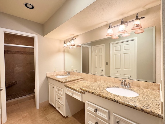 2323 Augusta Dr Unit 36, Houston, TX 77057 - bathroom featuring vanity, a stall shower, and tile patterned flooring