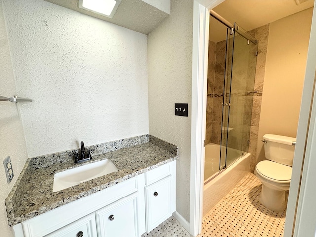 2323 Augusta Dr Unit 36, Houston, TX 77057 - bathroom with combined bath / shower with glass door, vanity, and a textured wall
