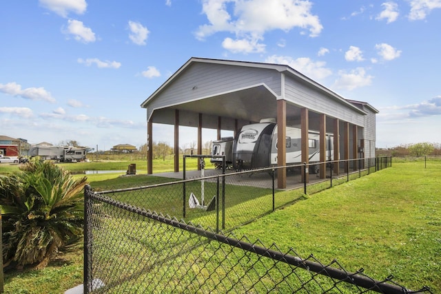 979 Sea Spray Dr, Crystal Beach, TX 77650 - view of outbuilding with driveway and fence