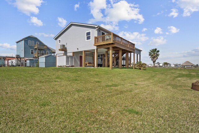 979 Sea Spray Dr, Crystal Beach, TX 77650 - back of property featuring a deck and a yard
