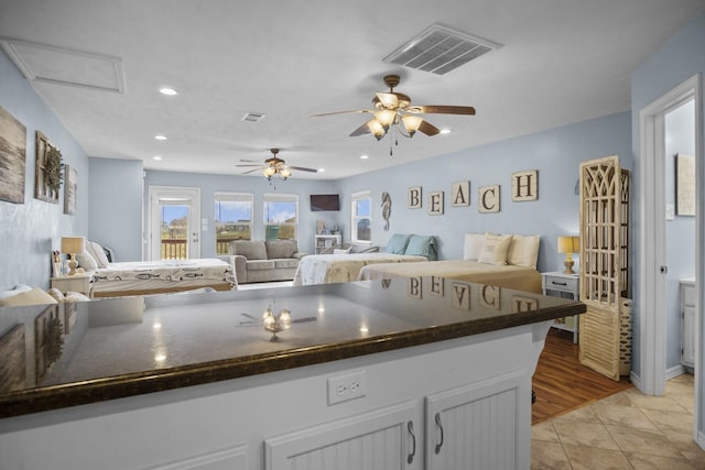979 Sea Spray Dr, Crystal Beach, TX 77650 - kitchen with dark countertops, visible vents, recessed lighting, and open floor plan