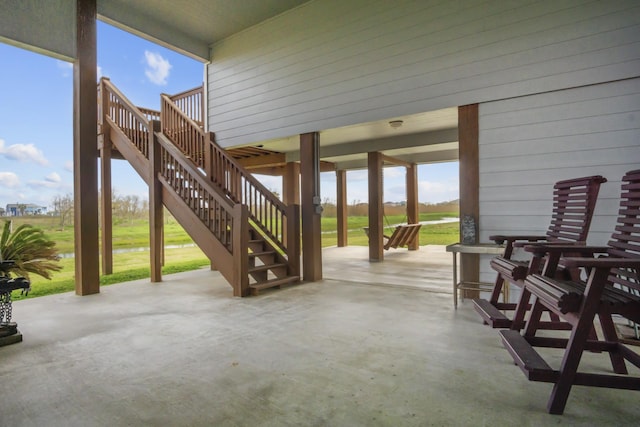 979 Sea Spray Dr, Crystal Beach, TX 77650 - view of patio / terrace featuring stairs