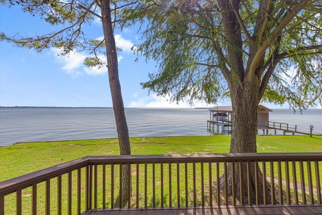 182 Cedar Hill Dr, Livingston, TX 77351 - wooden deck featuring a yard and a water view